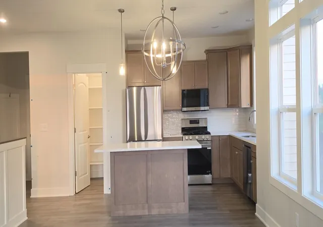 Listing Photo 1 - Condo for sale in building located at 5535 Canal Ave SW, Wyoming, MI 49418 - Unit #62