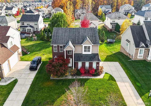 Photo 1 of Single family home for sale at 57879 Cider Ml Dr, New Hudson, MI 48165 | MLS# 20261086489 | Listing updated on 2026-10-30
