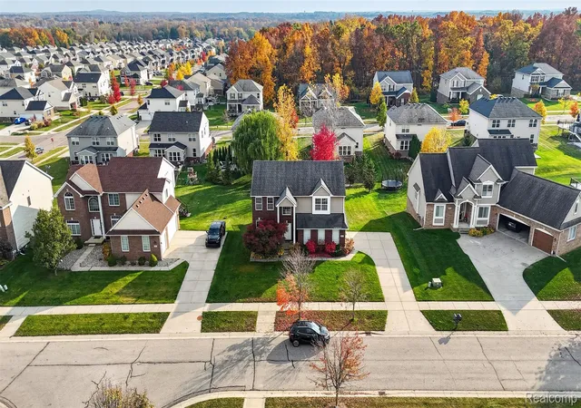 Photo 2 of Single family home for sale at 57879 Cider Ml Dr, New Hudson, MI 48165 | MLS# 20261086489 | Listing updated on 2026-10-30