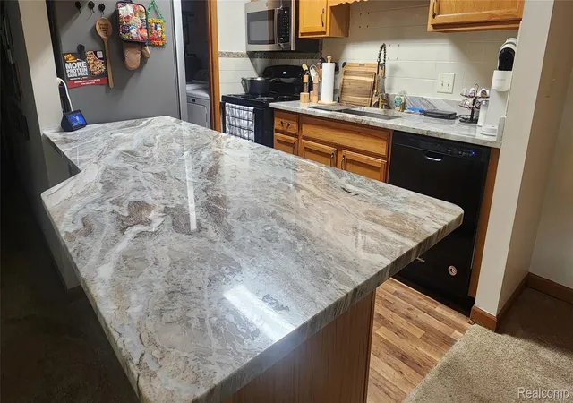 Listing Photo 1 - Condo for sale in building located at 1385 Harbour Blvd, Trenton, MI 48183 - Unit #129