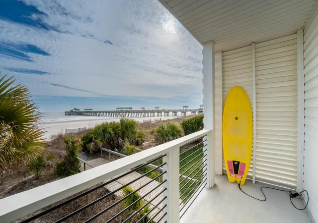 Photo 1 of Townhouse for sale at 115 E Arctic Ave #1A, Folly Beach, SC 29439 | MLS# 26024760 | Listing updated on 2026-09-02