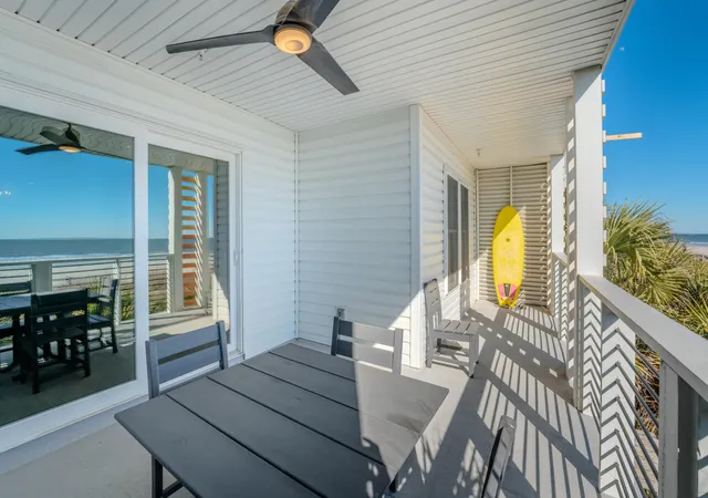 Photo 1 of Townhouse for sale at 115 E Arctic Ave #1B, Folly Beach, SC 29439 | MLS# 26024759 | Listing updated on 2026-09-02