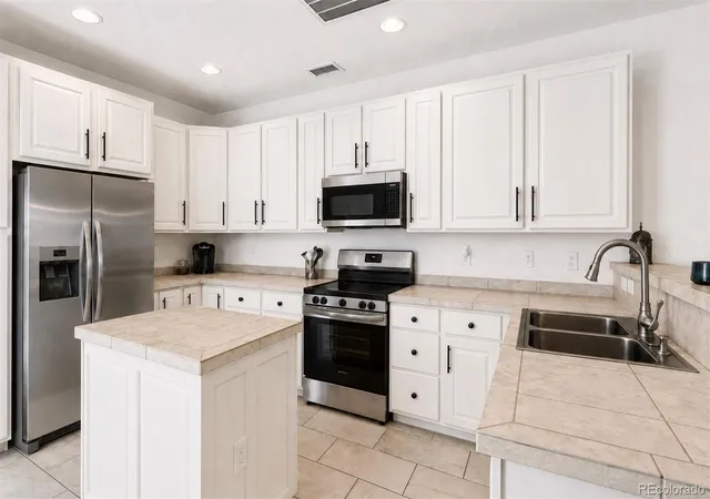 Photo 1 of Townhouse for sale at 13634 Garfield St #B, Thornton, CO 80602 | MLS# 6838087 | Listing updated on 2026-09-04