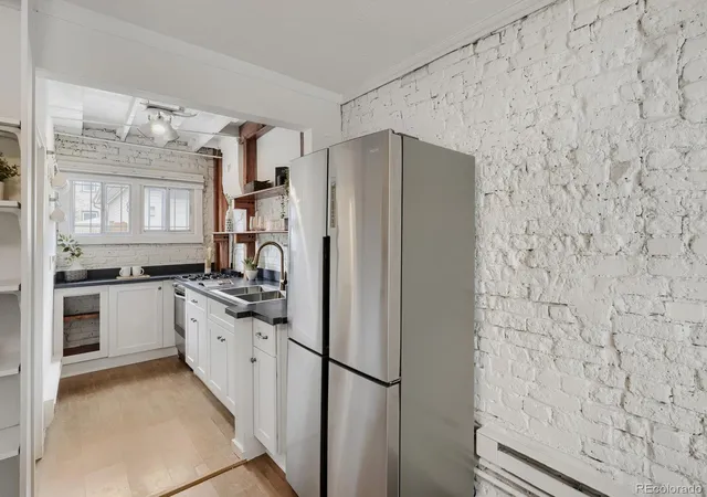 Photo 4 of Condo for sale at 1059 N Emerson St #C, Denver, CO 80218 | MLS# 7421012 | Listing updated on 2026-09-08