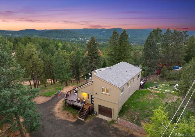 Photo 3 of Single family home for sale at 330 W Ridge Dr, Woodland Park, CO 80863 | MLS# 5018359 | Listing updated on 2026-09-03