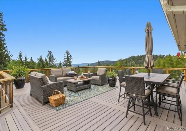 Photo 2 of Single family home for sale at 6773 Snowshoe Trl, Evergreen, CO 80439 | MLS# 9176183 | Listing updated on 2026-09-03