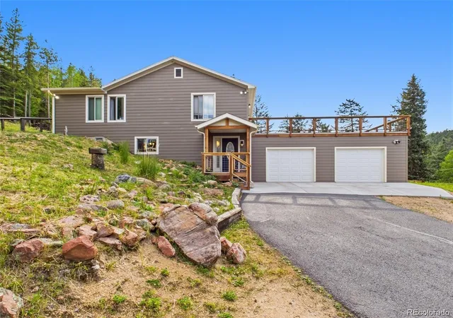 Photo 2 of Single family home for sale at 6773 Snowshoe Trl, Evergreen, CO 80439 | MLS# 9176183 | Listing updated on 2026-09-03