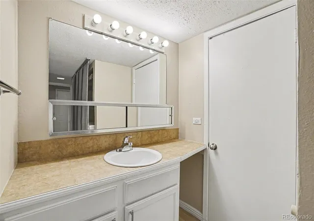 Listing Photo 5 - Condo for sale in building located at 3426 S Locust St, Denver, CO 80222 - Unit #F