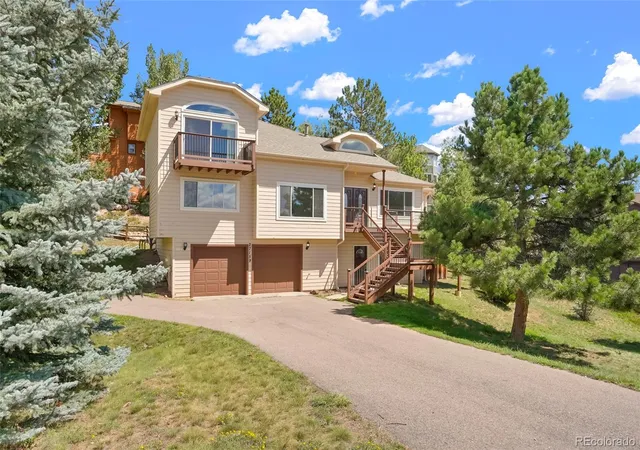 Photo 1 of Single family home for sale at 27159 Sun Ridge Dr, Evergreen, CO 80439 | MLS# 2146881 | Listing updated on 2026-09-02