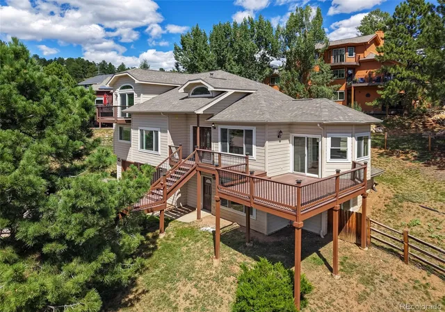 Photo 3 of Single family home for sale at 27159 Sun Ridge Dr, Evergreen, CO 80439 | MLS# 2146881 | Listing updated on 2026-09-02