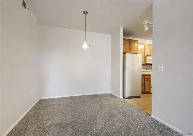 Listing Photo 5 - Condo for sale in building located at 3865 S Dayton St, Aurora, CO 80014 - Unit #101