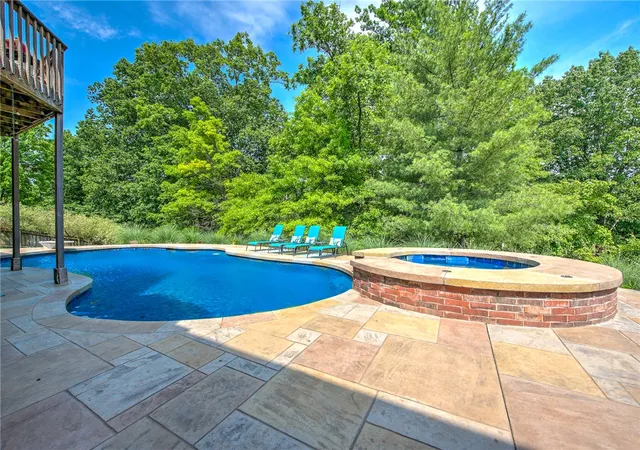 Photo 3 of Single family home for sale at 1406 NE Blf Spring Ave, Bentonville, AR 72712 | MLS# 1329576 | Listing updated on 2026-09-09
