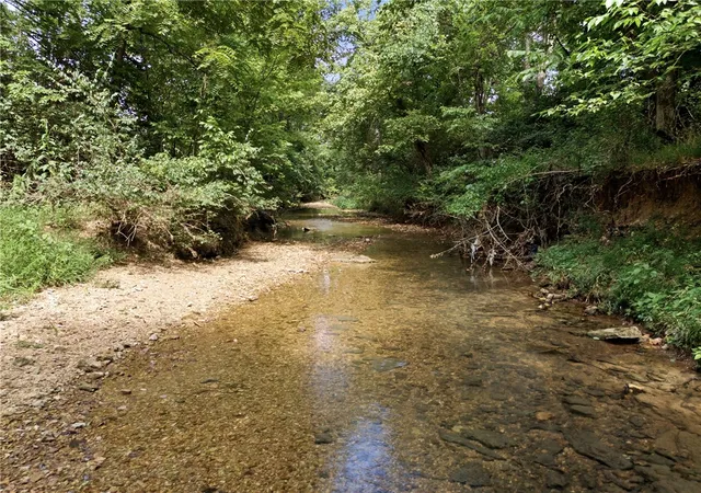 Photo 4 of Land for sale at All Lots Puppy Crk Rd, Lowell, AR 72745 | MLS# 1335948 | Listing updated on 2026-08-31