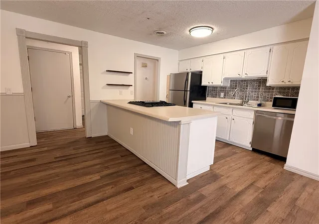 Photo 4 of Single family home for sale at 1019 W School St, Siloam Springs, AR 72761 | MLS# 1352743 | Listing updated on 2026-08-31