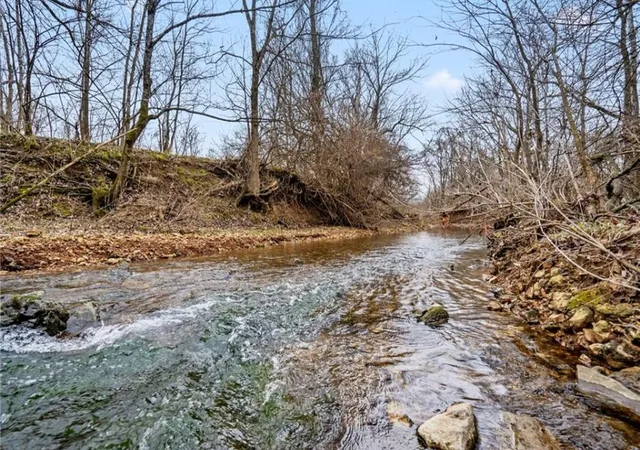 Photo 3 of Land for sale at Tract 3 Puppy Crk Rd, Lowell, AR 72745 | MLS# 1355887 | Listing updated on 2026-09-12