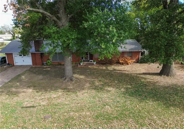 Photo 1 of Single family home for sale at 1002 Sw 2nd Avenue, Gravette, AR 72736 | MLS# 1363664 | Listing updated on 2026-10-21