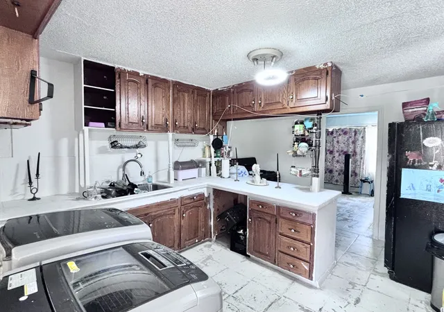 Photo 2 of Single family home for sale at 1827 W Archer St, Tulsa, OK 74127 | MLS# 2621658 | Listing updated on 2026-09-08