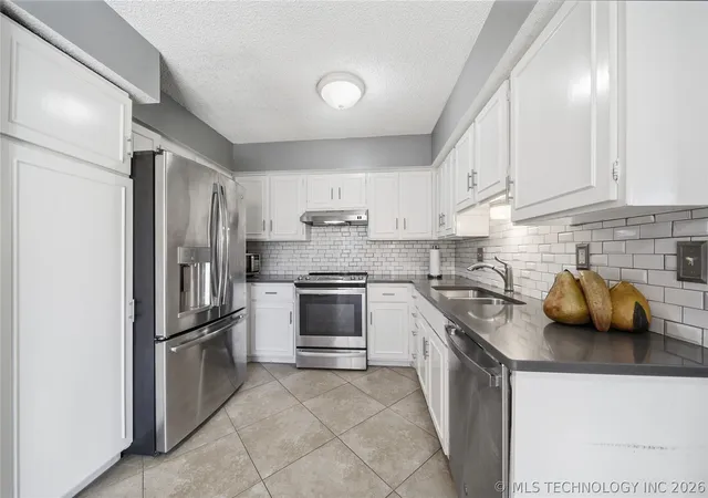 Photo 3 of Townhouse for sale at 1136 S 110th East Ave #13-3C, Tulsa, OK 74128 | MLS# 2622877 | Listing updated on 2026-09-06
