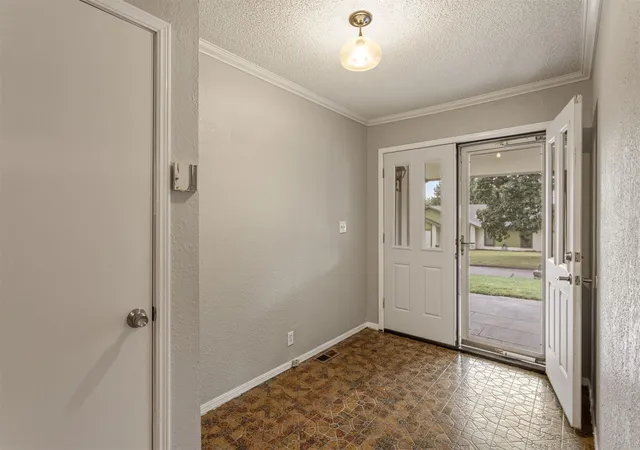 Photo 3 of Single family home for sale at 1405 W Young St, Tulsa, OK 74127 | MLS# 2630937 | Listing updated on 2026-09-22