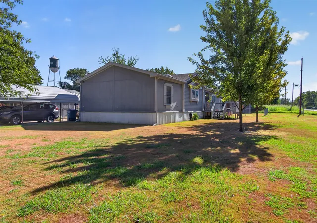 Photo 3 of Manufactured home for sale at 102 NE 1st Street, Adair, OK 74330 | MLS# 2632772 | Listing updated on 2026-09-04