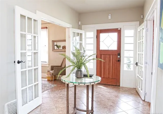 Photo 3 of Single family home for sale at 1303 E 17th Place, Tulsa, OK 74120 | MLS# 2633176 | Listing updated on 2026-09-21