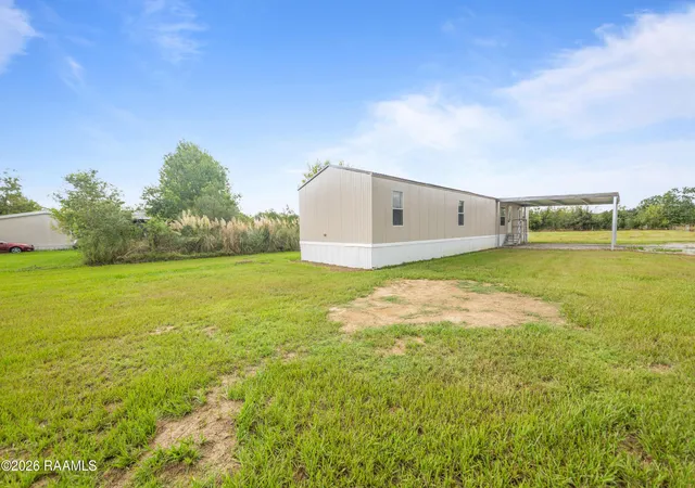Photo 2 of Manufactured home for sale at 202 Quail Holw Dr, Church Point, LA 70525 | MLS# 2600008440 | Listing updated on 2026-09-08