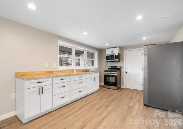 Photo 4 of House for sale at 2383 Dutch Cvs Rd, Canton, NC 28716 | MLS# 4420281 | Listing updated on 2026-09-02