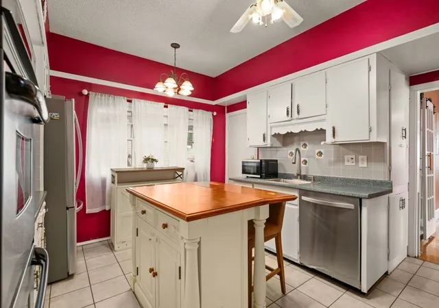 Photo 3 of Single family home for sale at 55 Arlington St, Lowell, MA 01854 | MLS# 73587436 | Listing updated on 2026-10-10