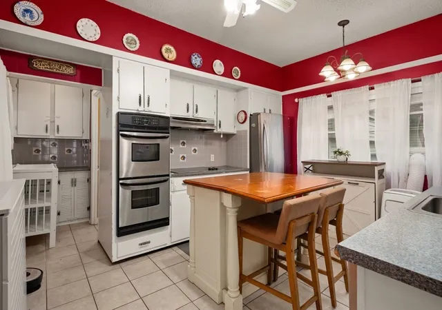 Photo 4 of Single family home for sale at 55 Arlington St, Lowell, MA 01854 | MLS# 73587436 | Listing updated on 2026-10-10