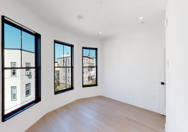 Photo 4 of Multi family home for sale at 19-21 Buttonwood St, Dorchester, MA 02125 | MLS# 73575226 | Listing updated on 2026-09-14