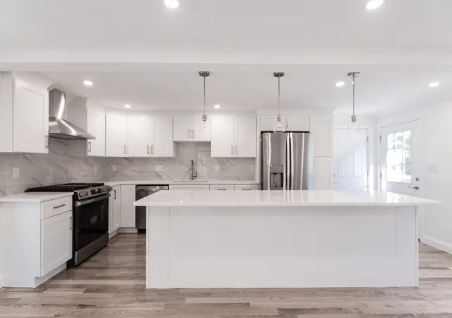 Photo 3 of Sale Pending at 32 Centre St, Milton, MA 02186 | MLS# 73588638 | Listing updated on 2026-10-11