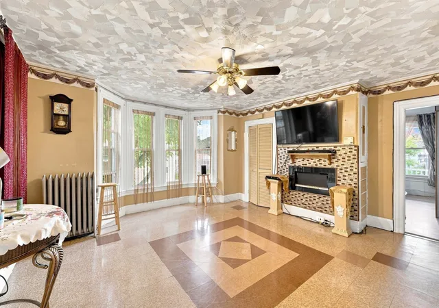Photo 3 of Multi family home for sale at 1 Grove St, Lawrence, MA 01841 | MLS# 73574569 | Listing updated on 2026-09-28