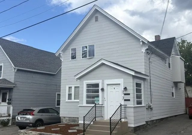 Photo 2 of Multi family home for sale at 97 Crawford St, Lowell, MA 01854 | MLS# 73570991 | Listing updated on 2026-09-06