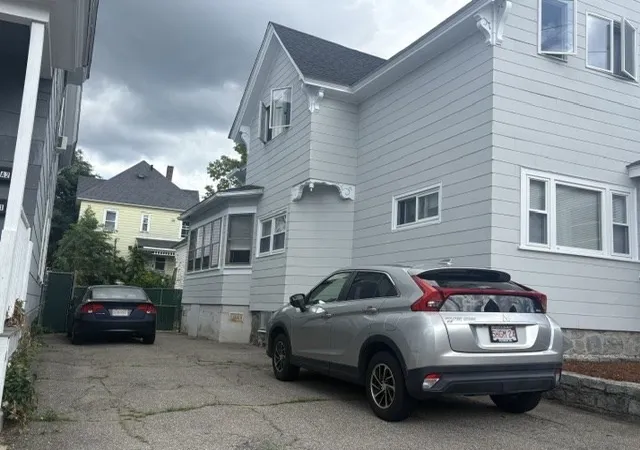 Photo 3 of Multi family home for sale at 97 Crawford St, Lowell, MA 01854 | MLS# 73570991 | Listing updated on 2026-09-06