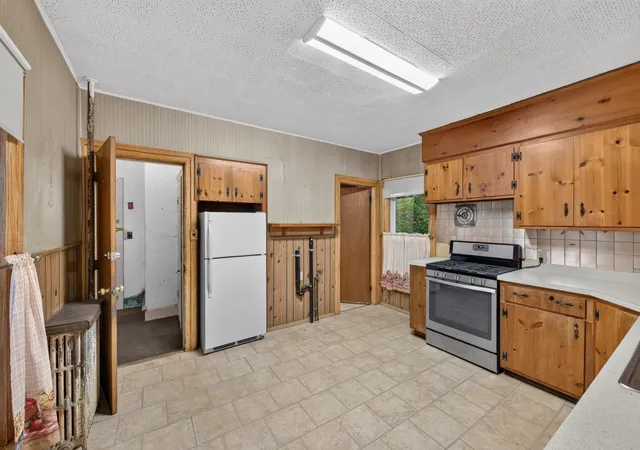 Photo 3 of Multi family home for sale at 63 Pleasant St, Spencer, MA 01562 | MLS# 73584560 | Listing updated on 2026-10-12