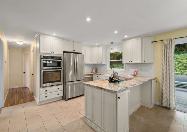 Photo 4 of Single family home for sale at 49 Elmwood St, Auburn, MA 01501 | MLS# 73575409 | Listing updated on 2026-09-28
