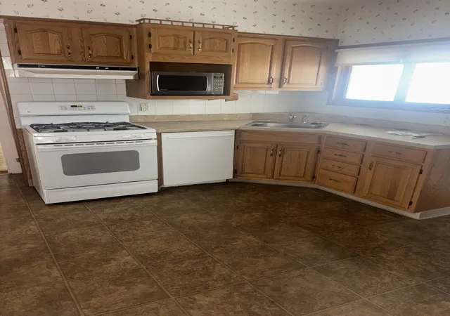Photo 3 of Sale Pending at 48 Gertrude Ave, Lowell, MA 01851 | MLS# 73572740 | Listing updated on 2026-09-23