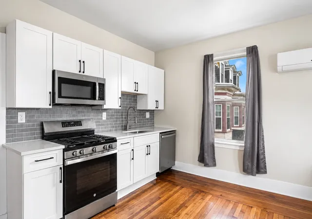 Photo 3 of Multi family home for sale at 49 W Cottage St, Dorchester, MA 02125 | MLS# 73588403 | Listing updated on 2026-10-12