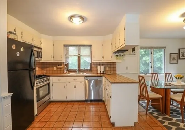 Photo 2 of Multi family home for sale at 34 Neofotistos Cir, Dracut, MA 01826 | MLS# 73571886 | Listing updated on 2026-09-16
