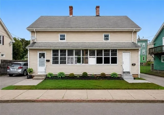 Photo 1 of Multi family home for sale at 411 Rathbun St, Woonsocket, RI 02895 | MLS# 73570515 | Listing updated on 2026-09-19