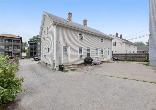 Photo 2 of Multi family home for sale at 411 Rathbun St, Woonsocket, RI 02895 | MLS# 73570515 | Listing updated on 2026-09-19