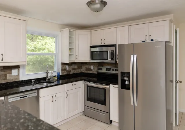 Photo 3 of Condo for sale at 7 Ledgeville Ave #A, Foxboro, MA 02035 | MLS# 73584772 | Listing updated on 2026-10-04