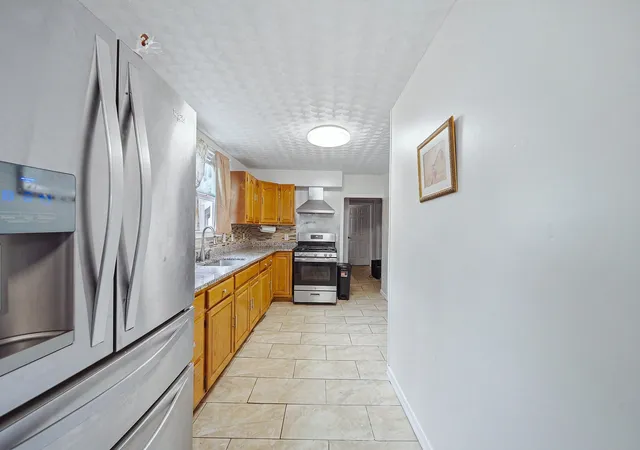 Photo 2 of Multi family home for sale at 8 Cady St, Lowell, MA 01852 | MLS# 73587442 | Listing updated on 2026-10-10