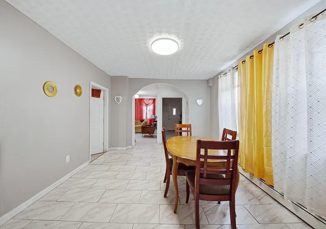 Photo 3 of Multi family home for sale at 8 Cady St, Lowell, MA 01852 | MLS# 73587442 | Listing updated on 2026-10-10