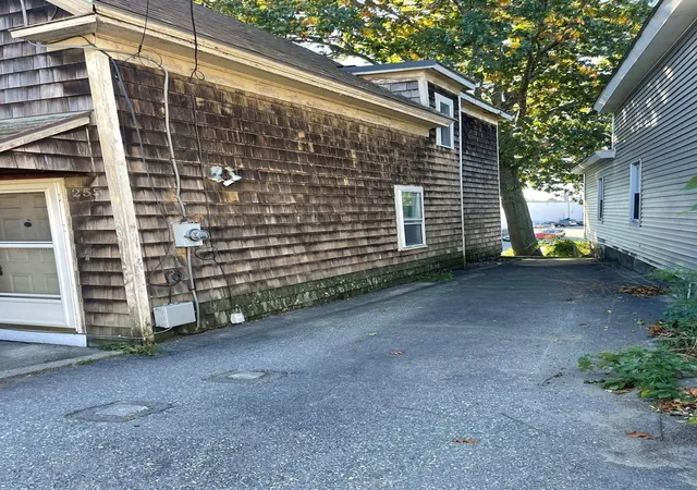 Photo 2 of Single family home for sale at 255 Plain St, Lowell, MA 01852 | MLS# 73587101 | Listing updated on 2026-10-10