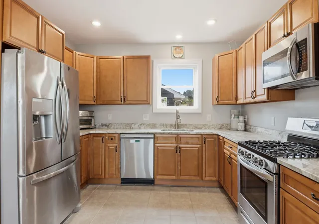 Photo 3 of Sale Pending at 13 Cosgrove St, Lowell, MA 01852 | MLS# 73574973 | Listing updated on 2026-09-30
