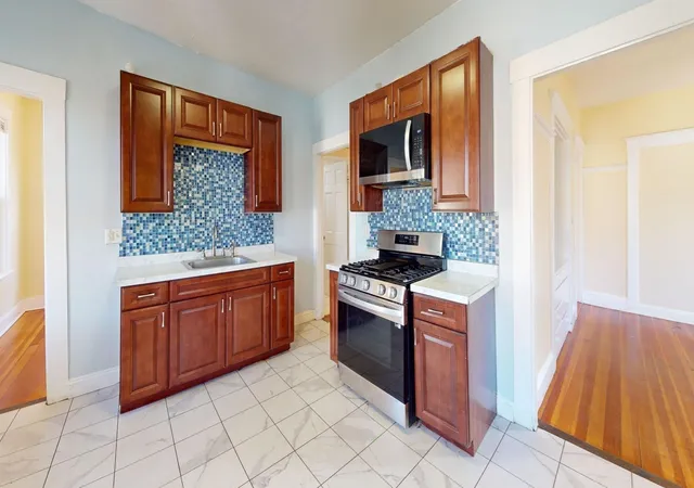 Photo 3 of Multi family home for sale at 19 Nightingale St, Dorchester Center, MA 02124 | MLS# 73571837 | Listing updated on 2026-09-12