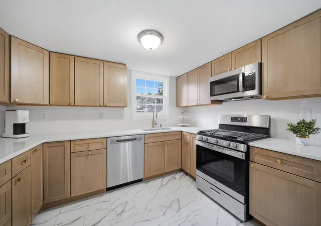 Photo 2 of Sale Pending at 57 Corbett St, Lowell, MA 01852 | MLS# 73575533 | Listing updated on 2026-09-24