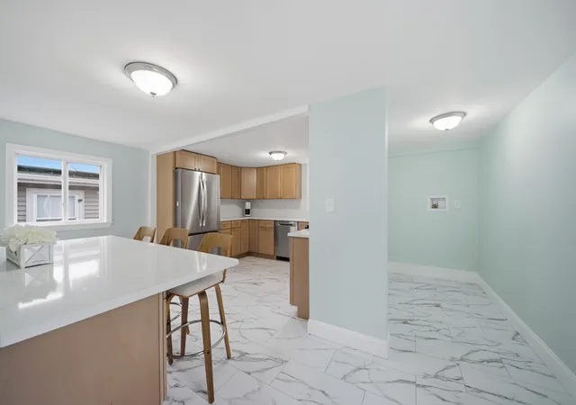 Photo 3 of Sale Pending at 57 Corbett St, Lowell, MA 01852 | MLS# 73575533 | Listing updated on 2026-09-24