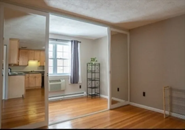 Listing Photo 1 - Condo for sale in building located at 4 Colonial Vlg Dr, Arlington, MA 02474 - Unit #7